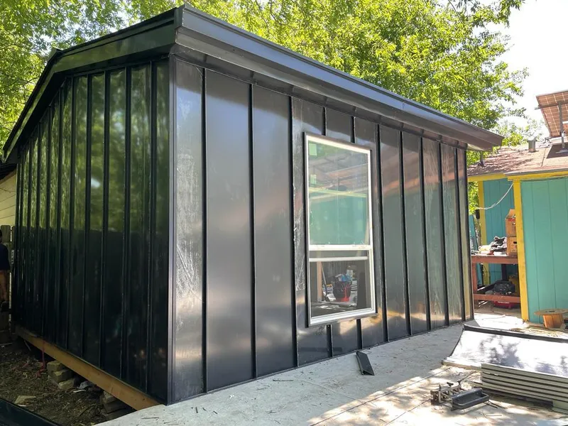 Black standing seam metal wall panels for Roof Inspection in Galena Park