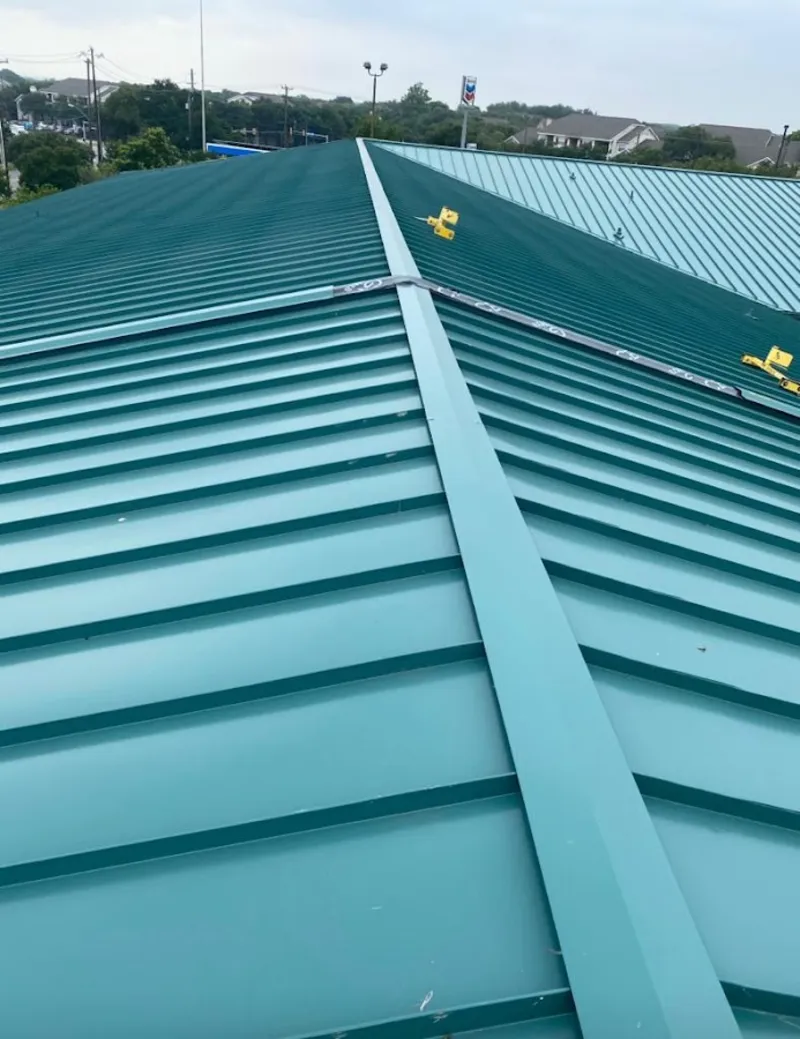 Green commercial metal roof ridge and valley for Metal Roof Repair in Galena Park
